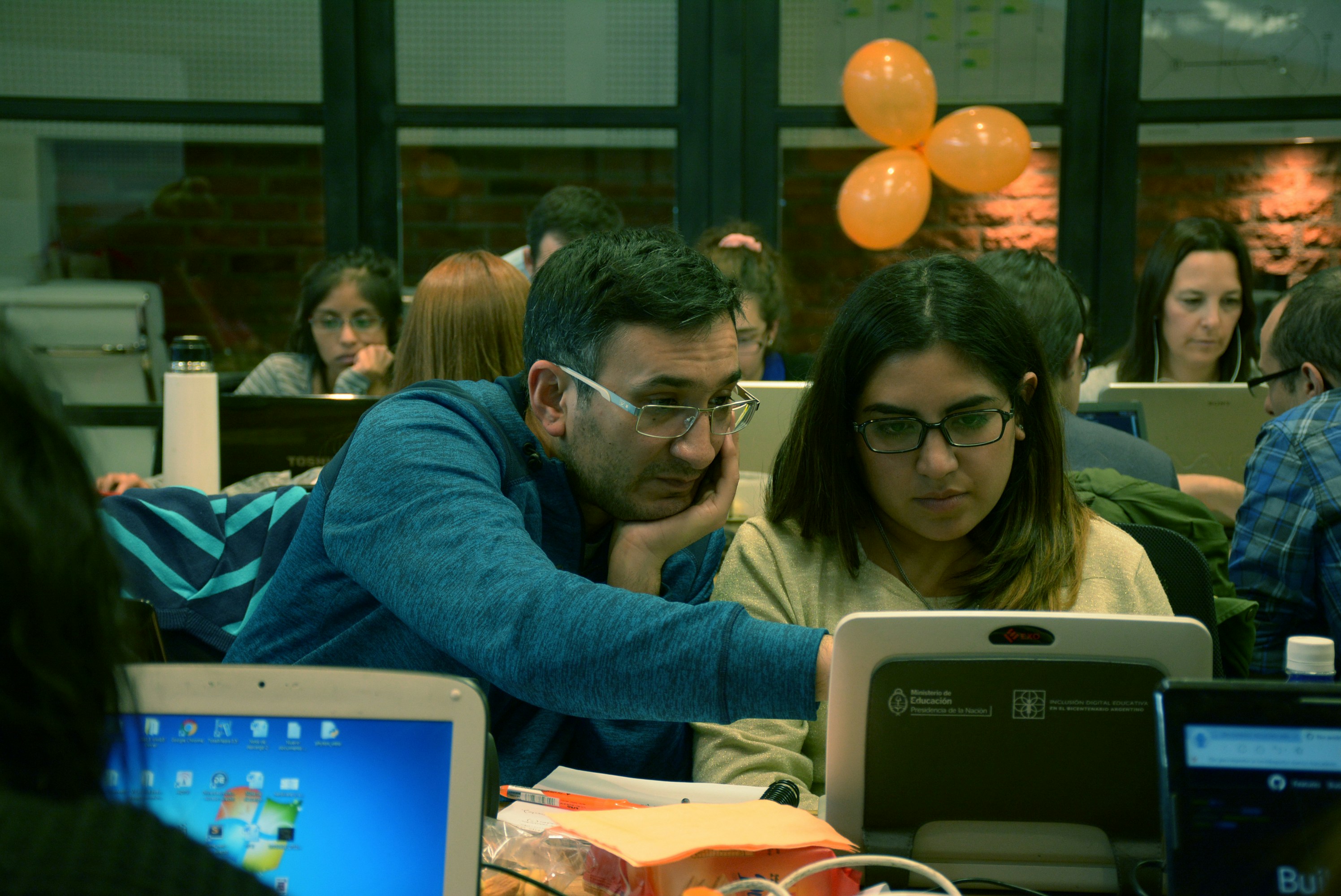 A team of creative professionals working together on a web design project